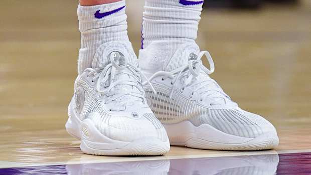 Los Angeles Lakers guard Austin Reaves' white Rigorer sneakers.